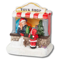 ŚWIĄTECZNE MIASTECZKO TOYS SHOP KOBIETA Z PREZENTAMI